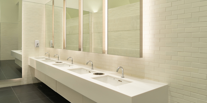 row of white modern marble ceramic wash basin